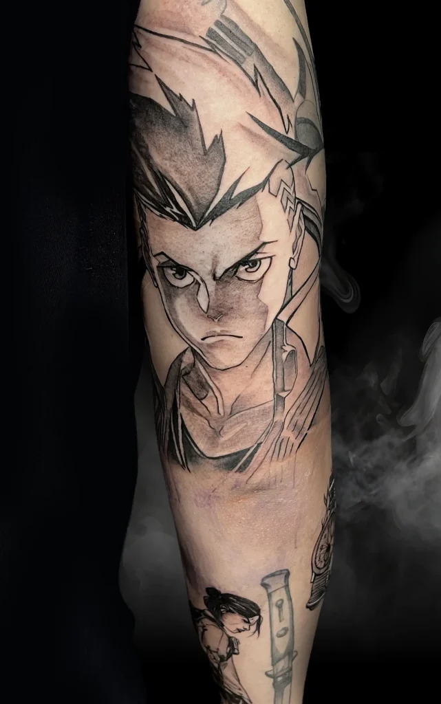 Detailní anime tetování na paži vytvořené tatérem Pashou v pražském studiu Magic Tattoo.